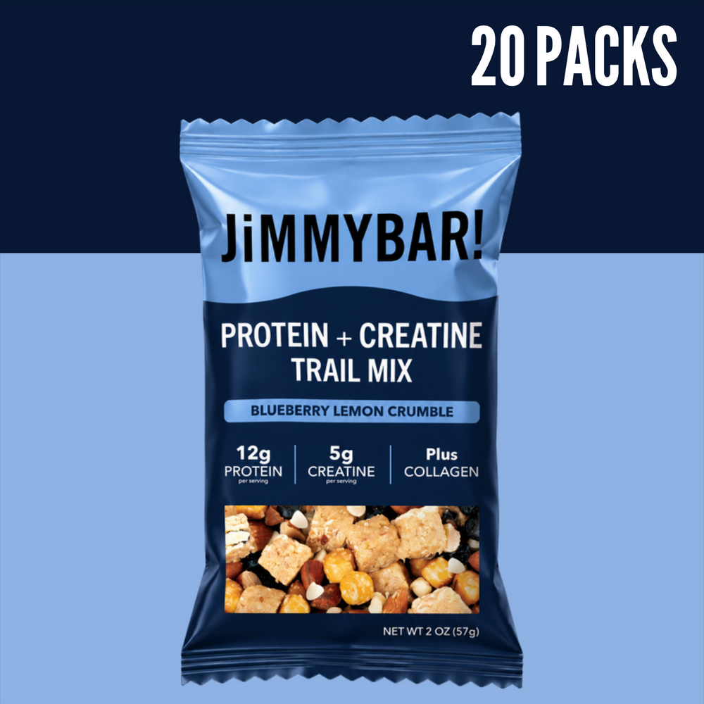 A single JimmyBar! protein + creatine trail mix bag labeled Blueberry Lemon Crumble, shown on a split dark navy and light blue background with large white text reading 20 PACKS.