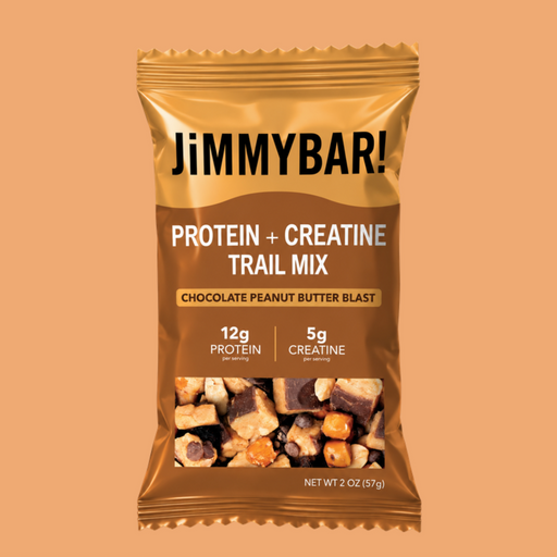 A bag of JimmyBar! Protein + Creatine Trail Mix, Chocolate Peanut Butter Blast flavor, shown on a solid peach background.